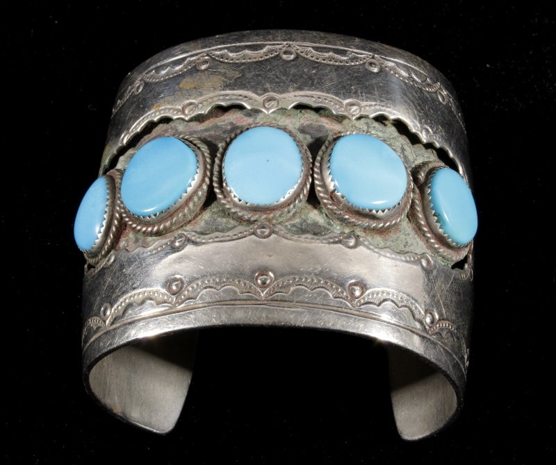Navajo Silver & Turquoise Shadowbox Cuff: This is a Navajo Native American Indian silver and turquoise cuff with a shadow box design. The bracelet is not hallmarked, but shows good quality. The piece has five excellent bright turquoise stones