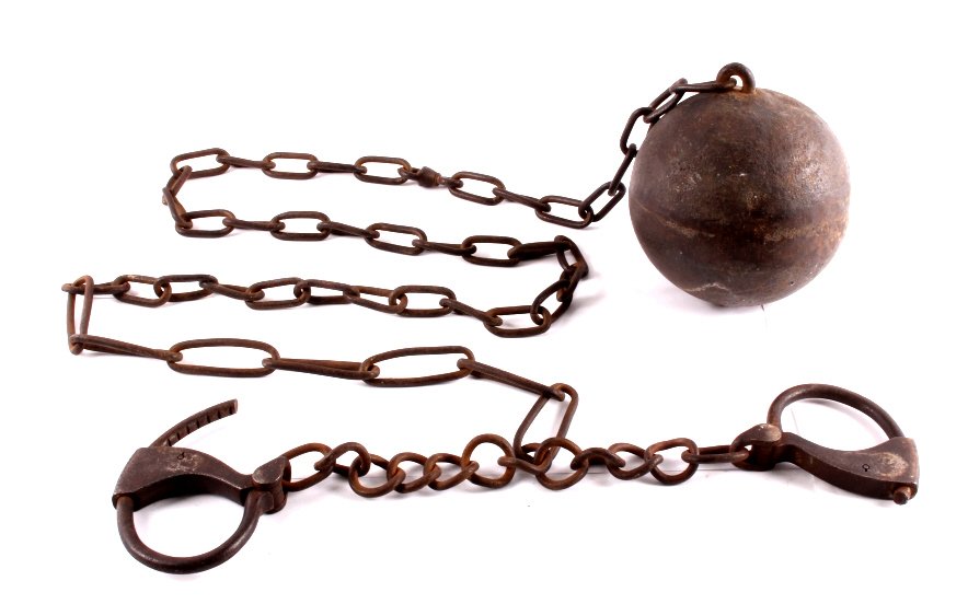 Montana State Prison Deer Lodge Ball & Leg Irons: This is an antique cast iron ball and leg irons from the Montana State Prison in Deer Lodge. Prison labors crews date back to the late 1800's at the prison. This ball and leg irons are in good overall
