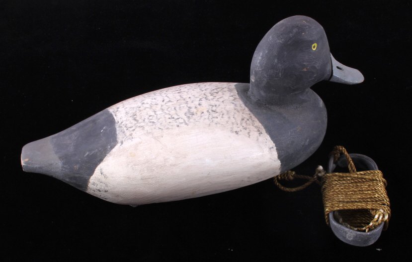 Antique Carved Wooden Lesser Scaup Duck Decoy: This is an antique carved wooden lesser scaup duck decoy. The piece has been hand painted and is signed "Parker" on the bottom. The decoy has a lead weight attached to the bottom as well as a line and