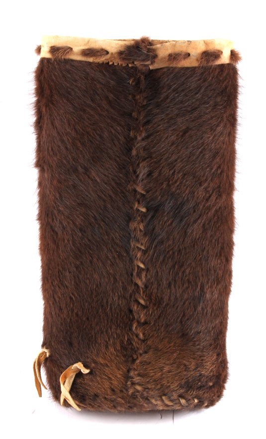 Native American Bear Hide Arrow Quiver: This is a Native American bear hide arrow quiver. The quiver is made from brown bear hide and has been laced with hide as well. The piece is in good overall condition. It measures 9" x 17".