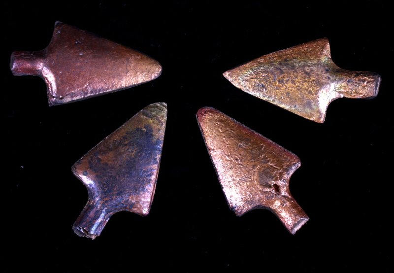 Anaconda Copper Mining Company Cast Arrowheads: This is a collection of four copper arrowheads from the Anaconda Copper Mining Company in Anaconda, Montana. It is believed these are either test ingots or were perhaps made as end of day pours from o