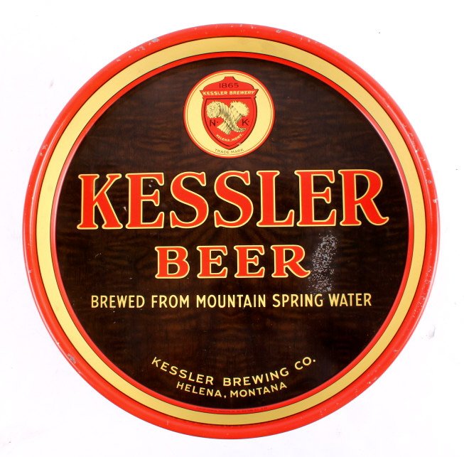 Kessler Brewing Co. Beer Tray from Helena Montana: This is an original Kessler Brewing Company beer tray from Helena, Montana. The tray shows the wood grain background with the shield logo near the top that reads "1865 Kessler Brewery N. K. Helena, Mo