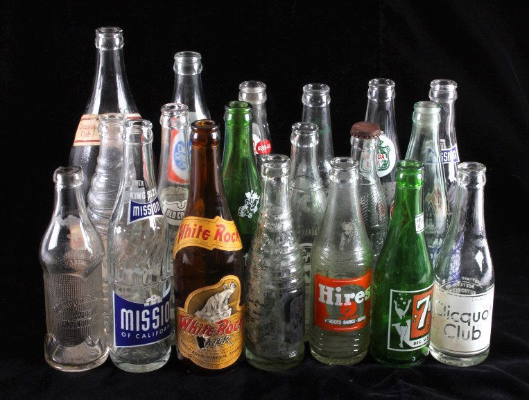 Vintage Soda Bottle Collection: This is a collection of vintage soda bottles. Included is Mission of California, White Rock Water, Old Colony, Kist, RC Cola, Diet Rite, Cliquot Club, Mountain Dew, Crush and many more. All the bottle
