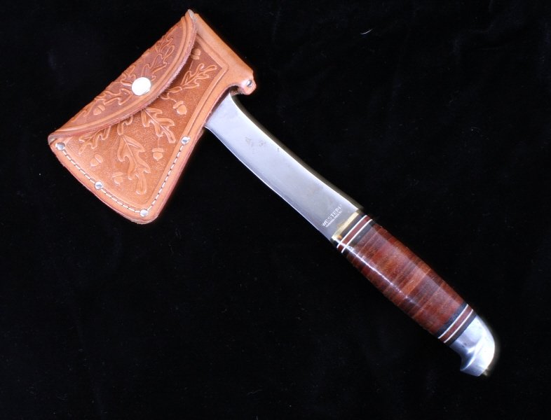 Western Boulder Colorado Camping Hunting Hatchet: This lot features a Western Boulder Colorado camping hunting hatchet. The Western Knife Company was a manufacturer of hunting knives which began operations in Boulder, Colorado in 1896. The company is