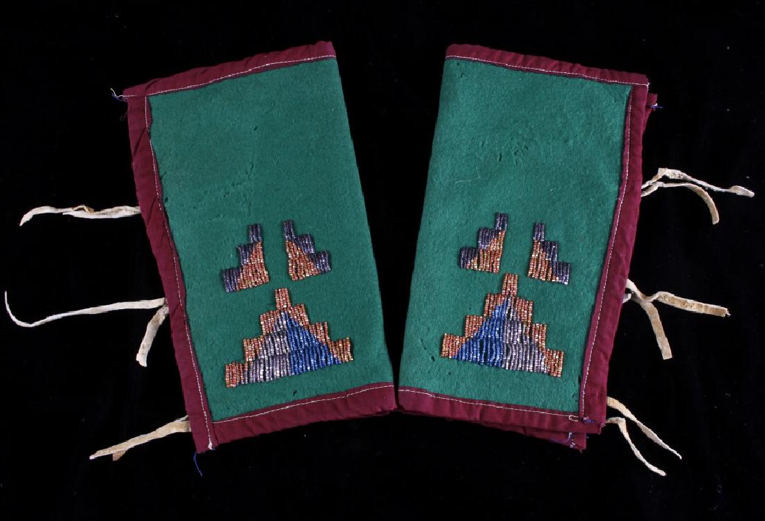 Plains Indian Trade Clothe Beaded Cuffs 1930-1950: This is a wonderful set of trade clothe and beaded cuffs from the Plains Native American Indians. The set is from circa 1930-1950's and shows matched beadwork with a geometric design in faceted early