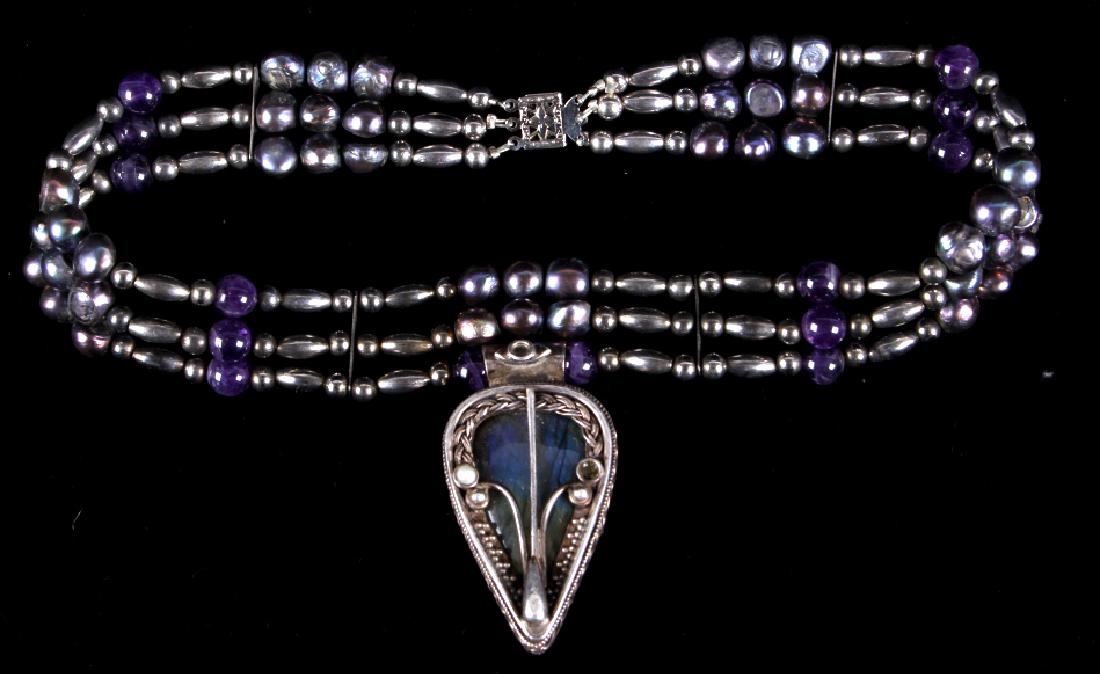 Art Nouveau Labradorite Amethyst Sterling Choker: This is an excellent Art Nouveau beautiful three strand choker with a large labradorite gem incase in impressive silverwork. The circa 19th to 20th century necklace shows exceptional craftsmanship. Th