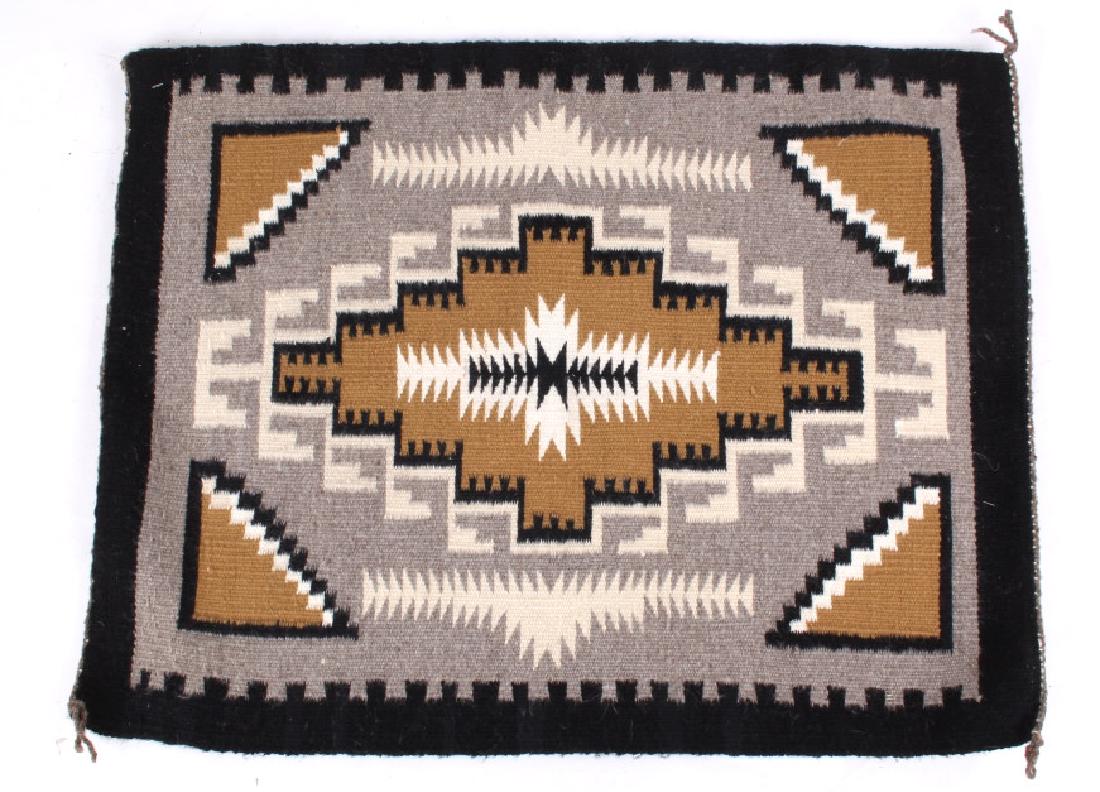 Navajo Klagetoh Pattern Wool Rug: This is a Navajo Native American hand dyed and knotted rug. The 100% wool rug features a distinct Klagetoh pattern. Klagetoh, which means "Hidden Springs" is a community south of Ganado, AZ and about 