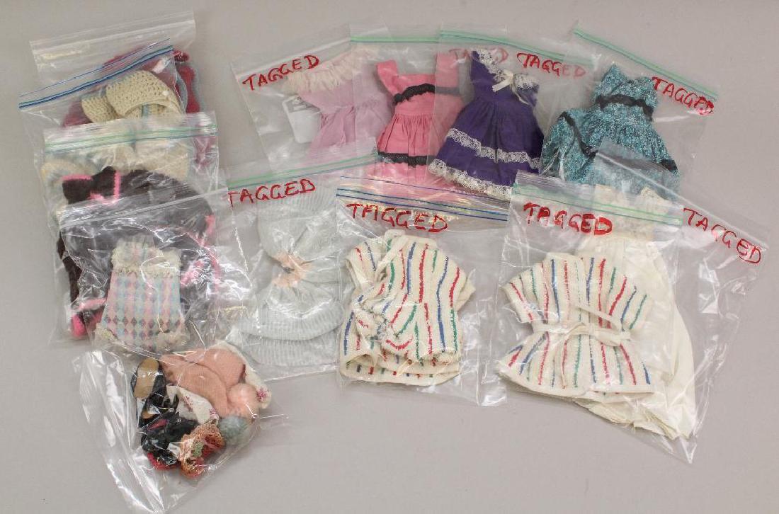 LOT OF ORIGINAL MARY HOYER CLOTHING, SOME TAGGED.: This clothing came with dolls #3130, #3131. (4) Tagged dresses. Tagged negligee. (2) Tagged terry cloth coverups and (1) tagged terrycloth bathing suit. Tagged petticoat. Unmarked teddy. (3) Unmarked 