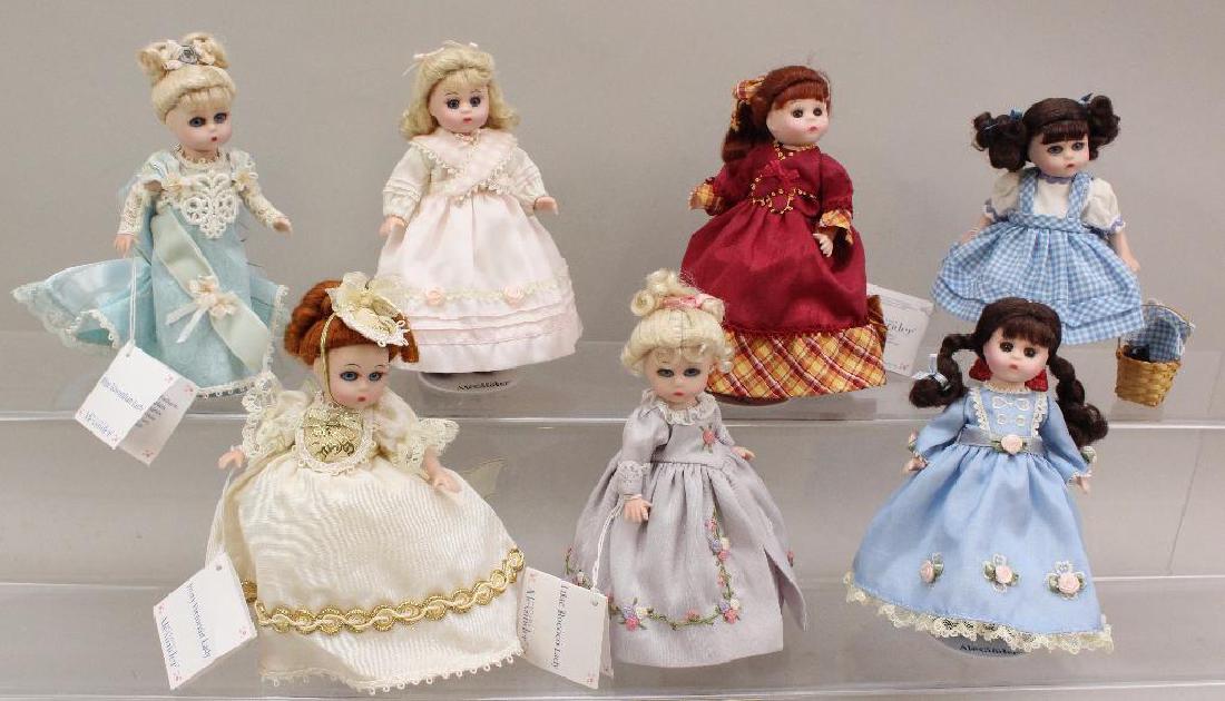 LOT OF (7) 5" ALL ORIGINAL MINT MADAME ALEXANDER MINI: Tagged 2000 - Fine Ladies of Fashion Collection: "Blue Edwardian Lady", "Lilac Rococo Lady", "Ivory Victorian Lady". Tagged 2000 - Wizard of Oz: "Dorothy" with Toto in basket. Marked (but no hang tags