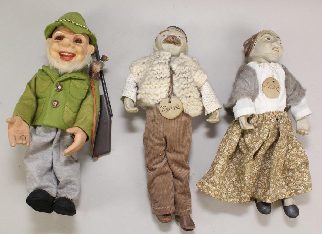 LOT OF (3) CHARACTER DOLLS.: 16" Unmarked papier mache(?) Leprechaun hunter with his rifle. Stationary eyes, mohair beard. Wool felt clothing, hat and shoes. Condition: age discoloration to clothing. This item is being sold AS IS