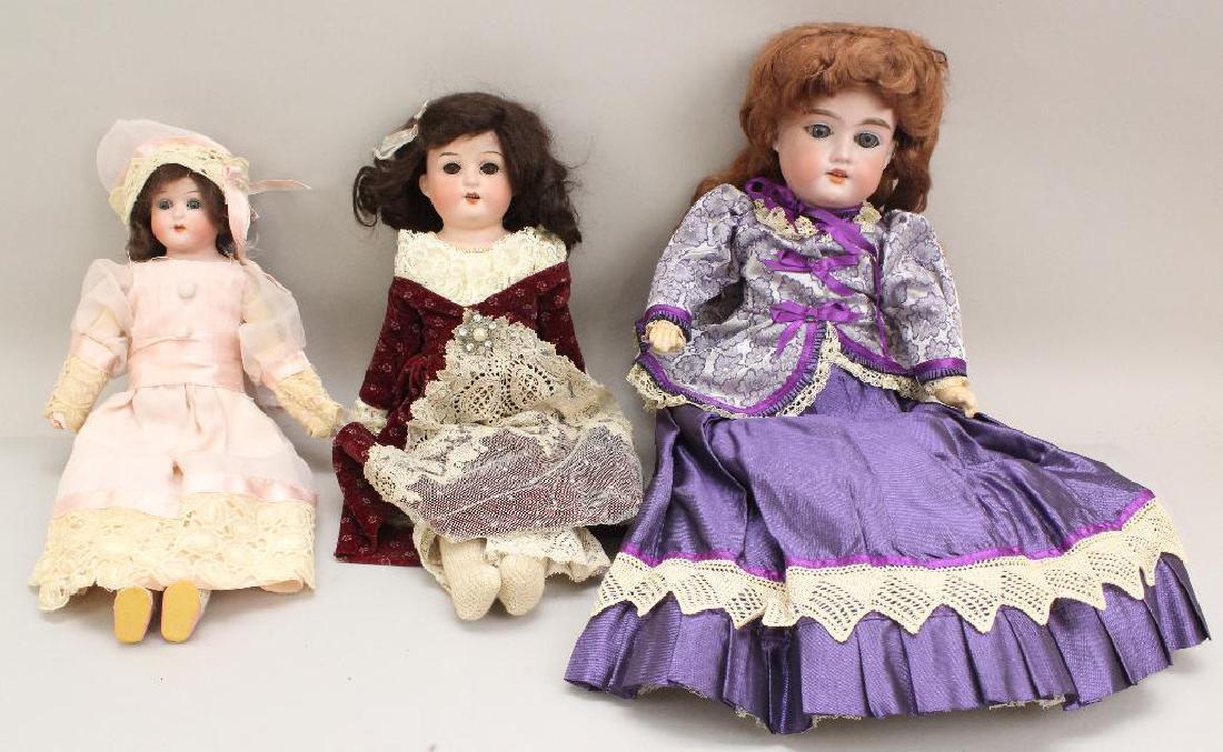 LOT OF (3) ANTIQUE BISQUE HEAD DOLLS: (2) HEUBACH (1 of 4)