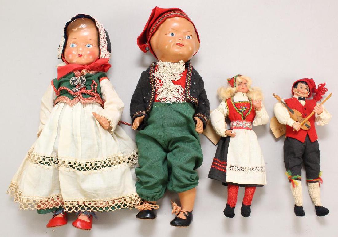 LOT OF ALL ORIGINAL NORWEGIAN DOLLS,.: This is an original family owner lot. Clothing on all of these dolls is very colorful. Pair of 9 1/2" dolls with papier mache heads, cloth bodies, celluloid hands. Painted features. Female has mohair 