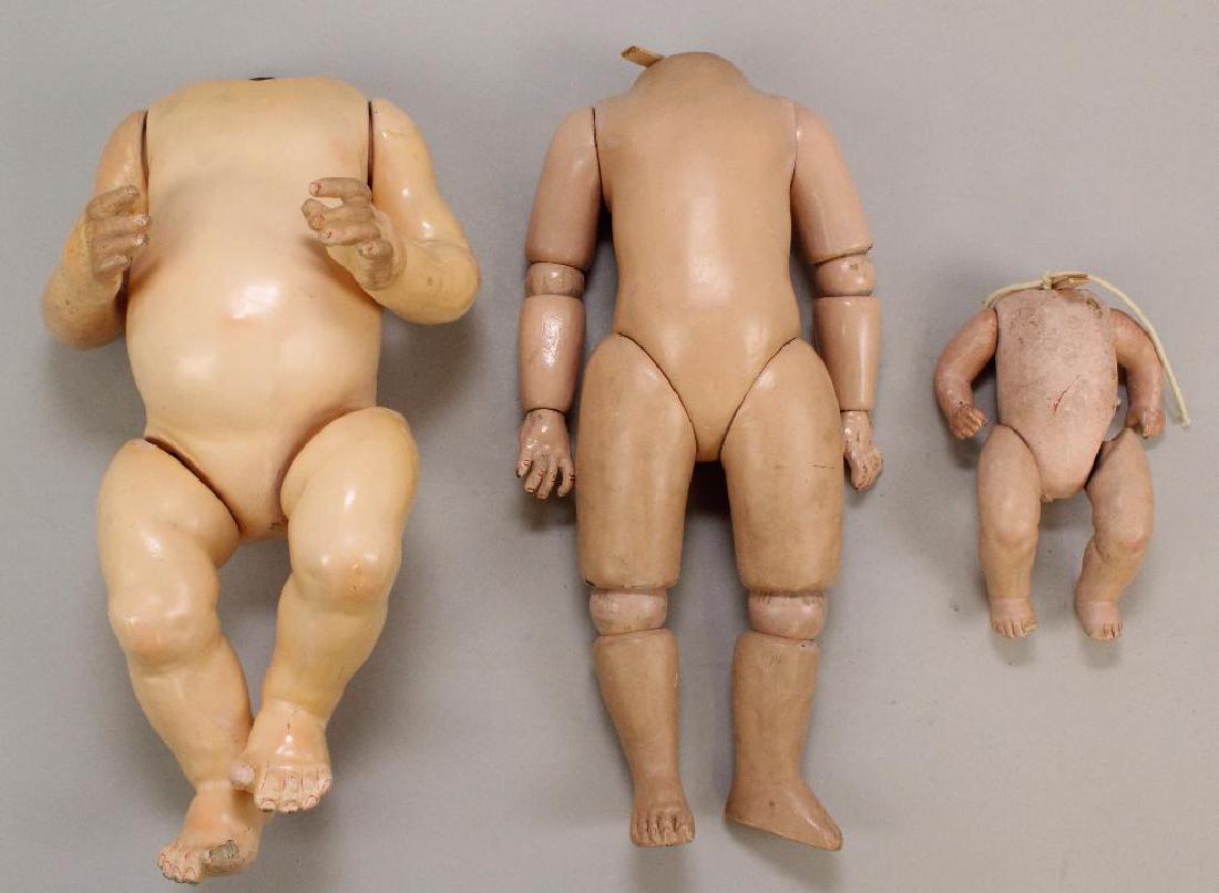BODY PARTS: (3) ANTIQUE PAPIER MACHE BODIES.: Body 1) 6 1/2" 5 Pc. bent limb baby body. Body 2) 14" 5 Pc. Bent limb baby body. (Elbow & finger repair.) Body 3) 14" (SFBJ?) ball jointed body with slanted thighs. Overall condition: this lot is 