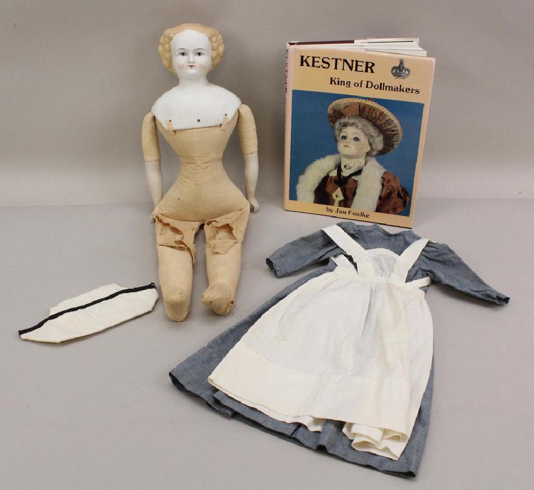 BODY PARTS: 21" UNMARKED PARIAN; NURSE UNIFORM; BOOK. (1 of 4)