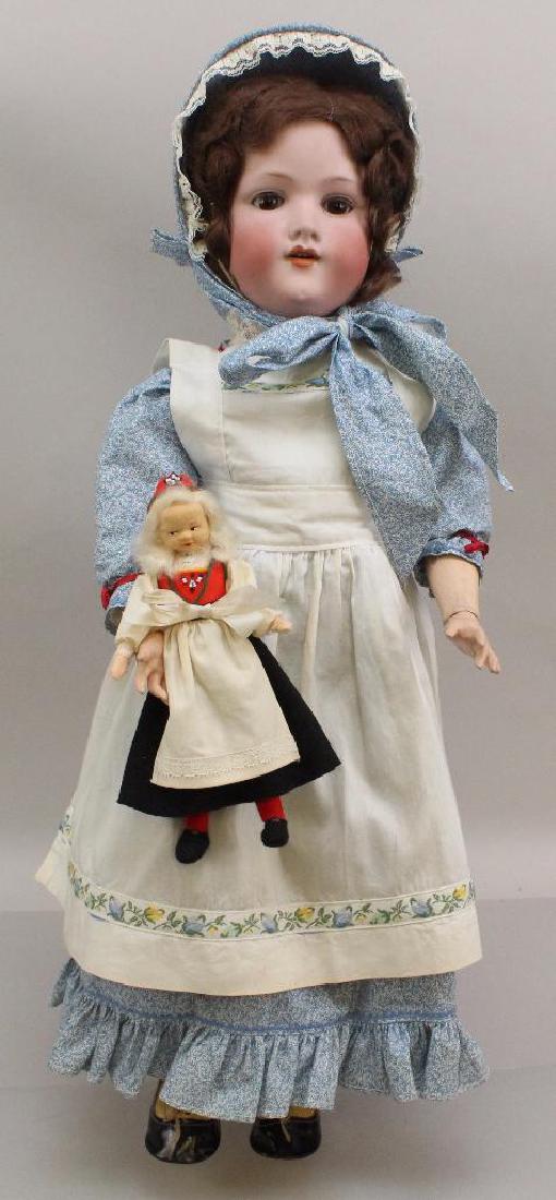 25" ARMAND MARSEILLE GERMANY 390 A.8.M ANTIQUE BISQUE: Brown sleep eyes, open mouth, brown mohair wig. Papier mache ball jointed body. Dressed in newer clothing, matching bonnet. Antique oilcloth shoes. Condition: mold imperfection under chin. Hands repai