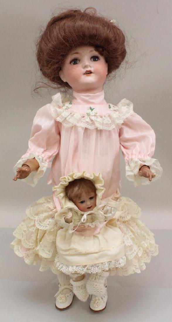 PAIR OF ANTIQUE BISQUE HEAD DOLLS: 18 1/2" C.M. (1 of 6)