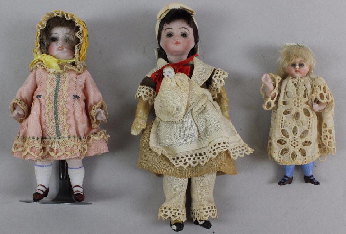 LOT OF (3) DOLLS WITH GLASS EYES: 3 1/2", 5", 5 1/2". (1 of 2)