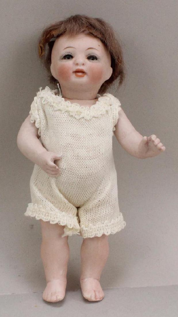 5"  178 4 1/0 ANTIQUE ALL BISQUE CHARACTER TODDLER. (1 of 3)