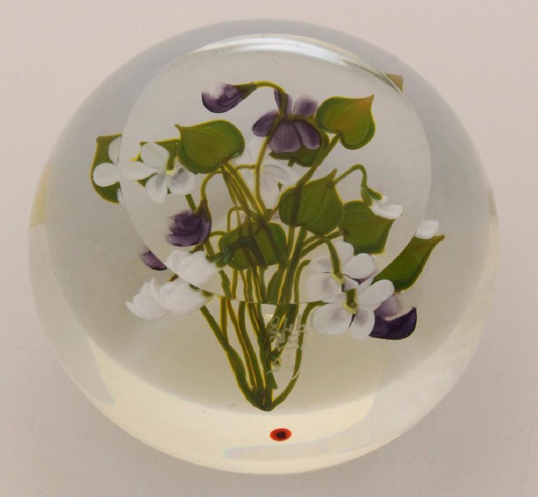 Paul Stankard (b 1943, New Jersey) Violet Paperweight: Lampworked glass. Botanical paperweight with violet flowers. Marked "S, 28/75, B152, 1978" on lower edge. Edition 28/75. 2.75"round.