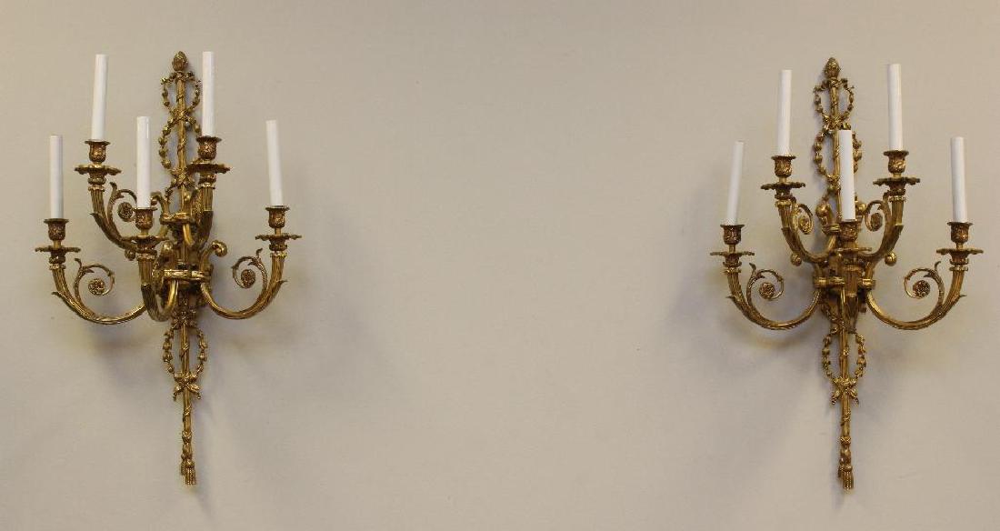 (2) Pair of Ornate Gilt Bronze Sconces: Overlapping bell flower stem with floral and sprig candleholders, 31"h.