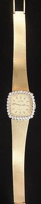 Ladies Gold and Diamond Dress Watch: 14K gold and diamond dress watch, Andre Pailet, quartz movement, approx. lot JDW.