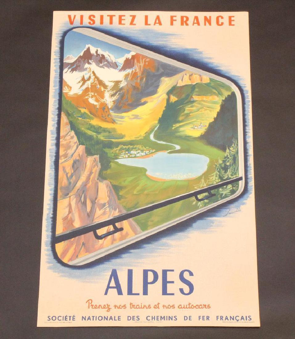 French Travel Poster: French travel poster for the Alps. Graphics show view of mountain village with Alps in background as viewed from window of a train. Poster measures 39" x 24" and exhibits some slight edge bumps. Circa