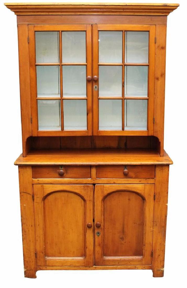 Diminutive Dutch Cupboard: Twelve light door top over a 6 inch pie shelf resting on a two drawer to door bass, mixed woods, 78"h x 43"w x 18"d.
