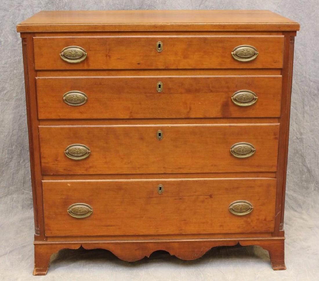 Hepplewhite Cherrywood Chest of Drawers: Molded one piece top with four graduated drawers, quarter columns, shaped apron on French feet, 39"h x 39.5"w x 20"d. Front left foot has been repaired.
