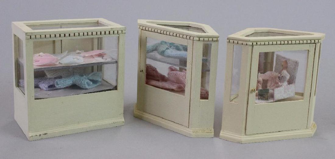 Corner & Display cases, painted bibs, knitted items (1 of 4)