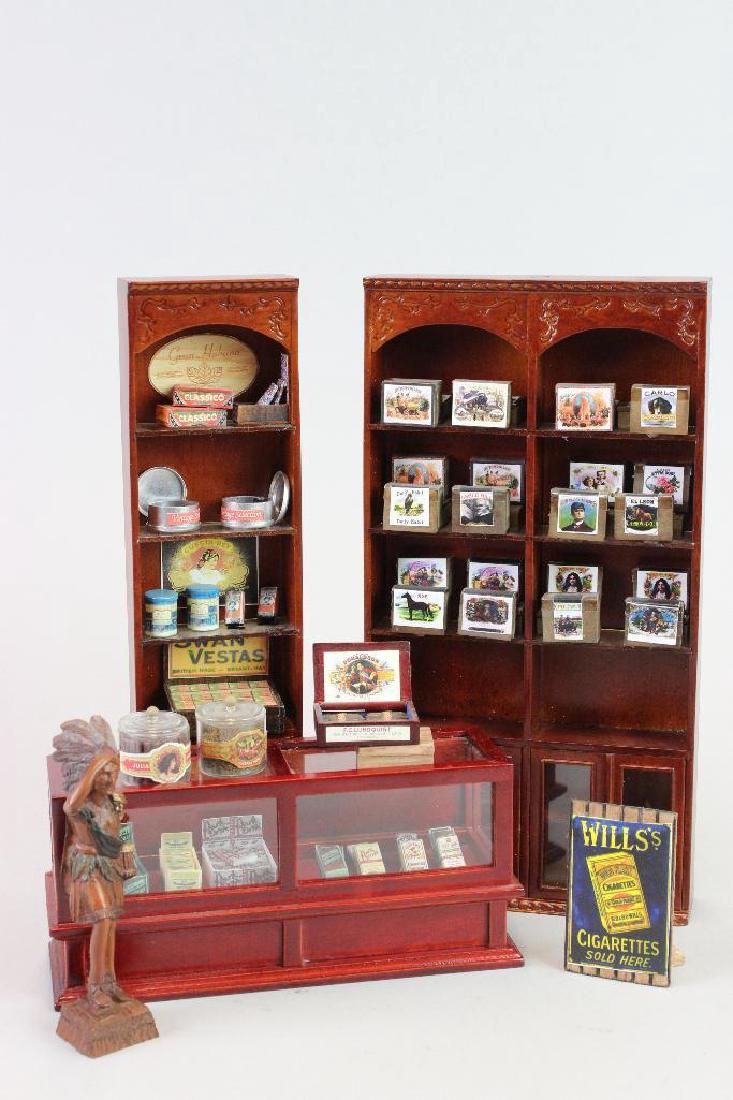 Display  cabinet; loose tobacco items; Indian statue (1 of 5)