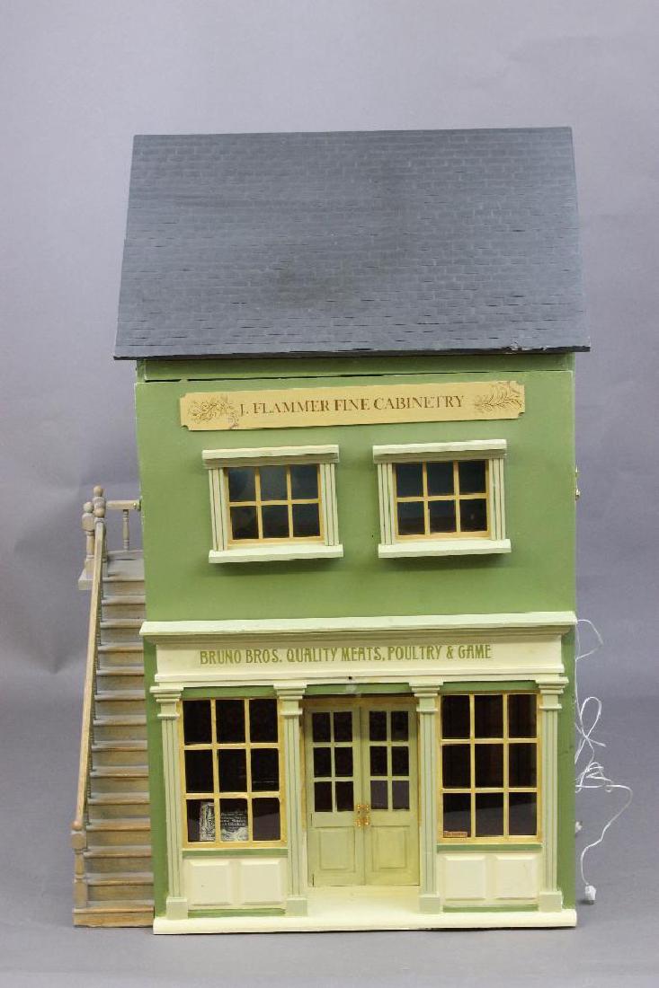 Bruno Bros.Butchers/Flammer Furniture Maker Dollhouse: This structure was made from a large shop kit by Anglesey Dollhouses, Wales UK. The first floor is the butcher and the second is the furniture makers workshop. The store fitting in the butcher's are a