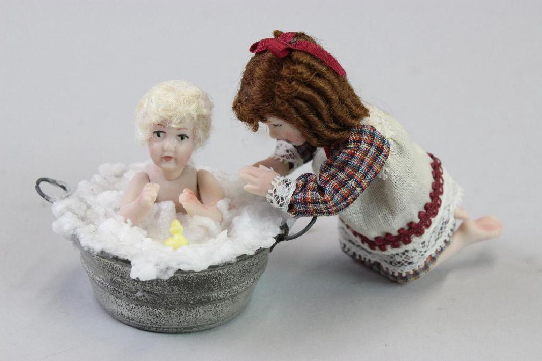 Big sister washing baby brother (1 of 3)