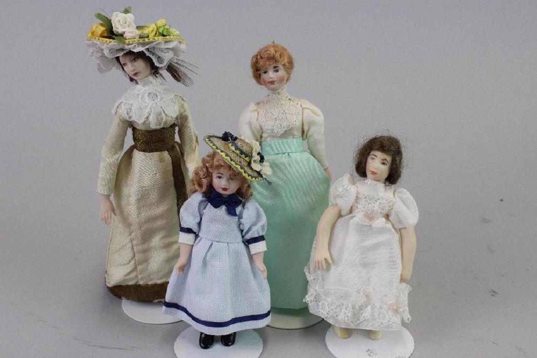 Two young girls and two lady dolls: Jill Nix; Au; Caroline Nix