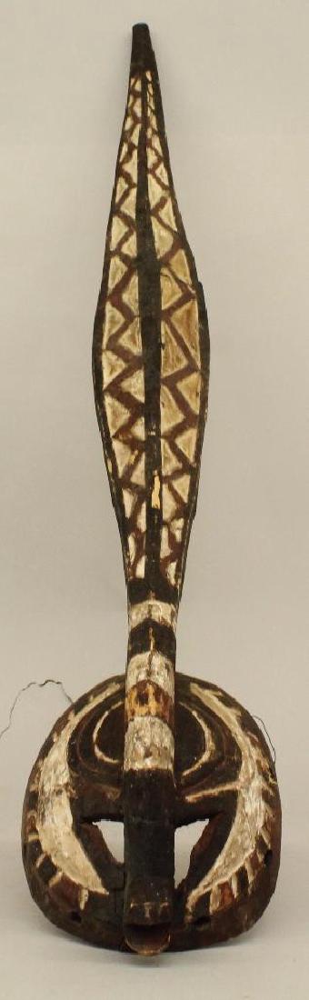 Bakongo Mask: Bakongo Mask. Congo, 20th Century. Carved Wood; Paint Decoration. Lg: 40" 