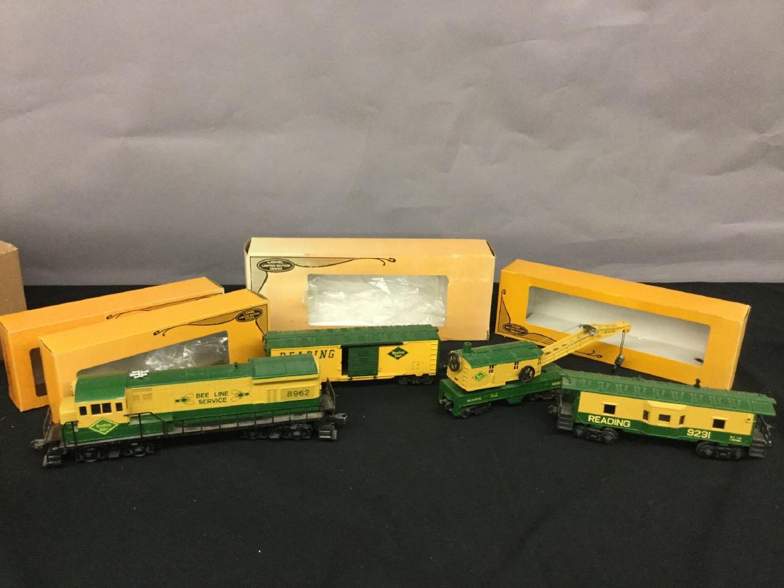 Grouping of four Lionel Trains, includes Engine. (1 of 8)