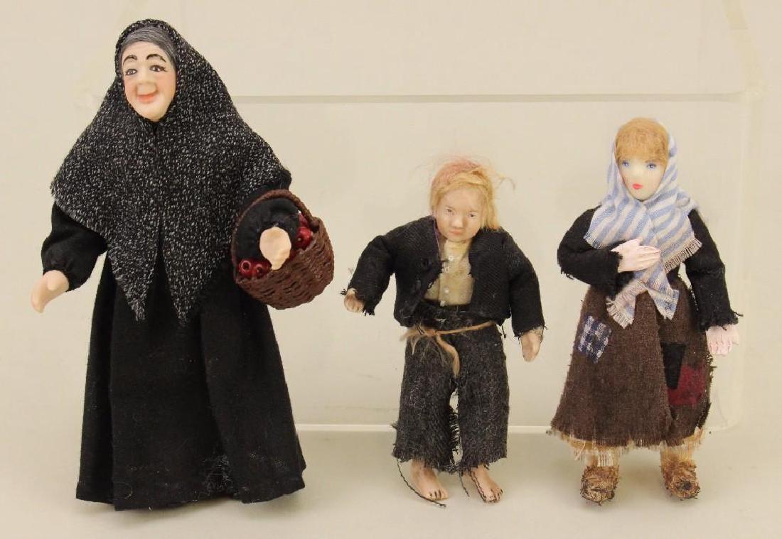Apple Seller and Beggar Boy and Girl: Apple Seller, AU. Beggar girl and boy, costume Cavalcade UK.