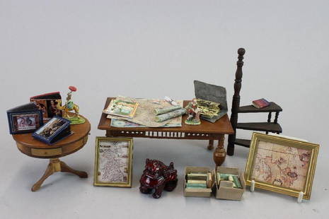 Display table, stairs, books, foo dog, map table,: Center display table Fomerz, library stairs, box of books and foo dog; Rare books aand map room table with items - table by Bespaq; Black Moor figurine Olszewski; Camel with man David Ward