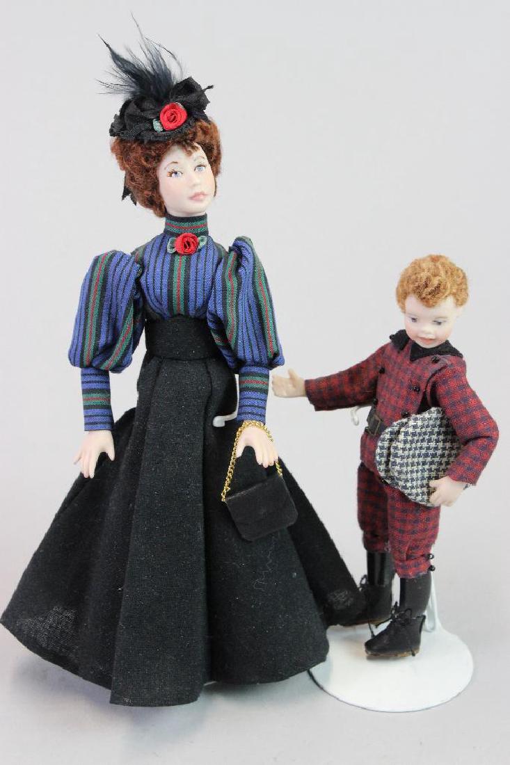Bookshop boy doll, shopper lady doll (1 of 4)