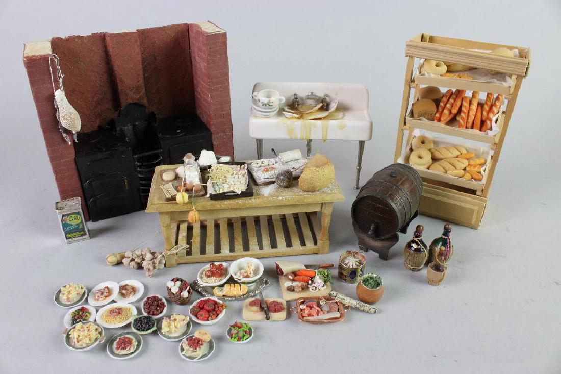 Table, artists made food items, shelf, sink, bottles,: Pasta table Silvia Cuicci; Italian food; Other artist made food lot AU; Bakery shelf D. Birnberg; Lot of food by Fran's food UK; Dirty sink D. Birnberg; Wine barrel Wright Guide; Stove Poseley crafts 
