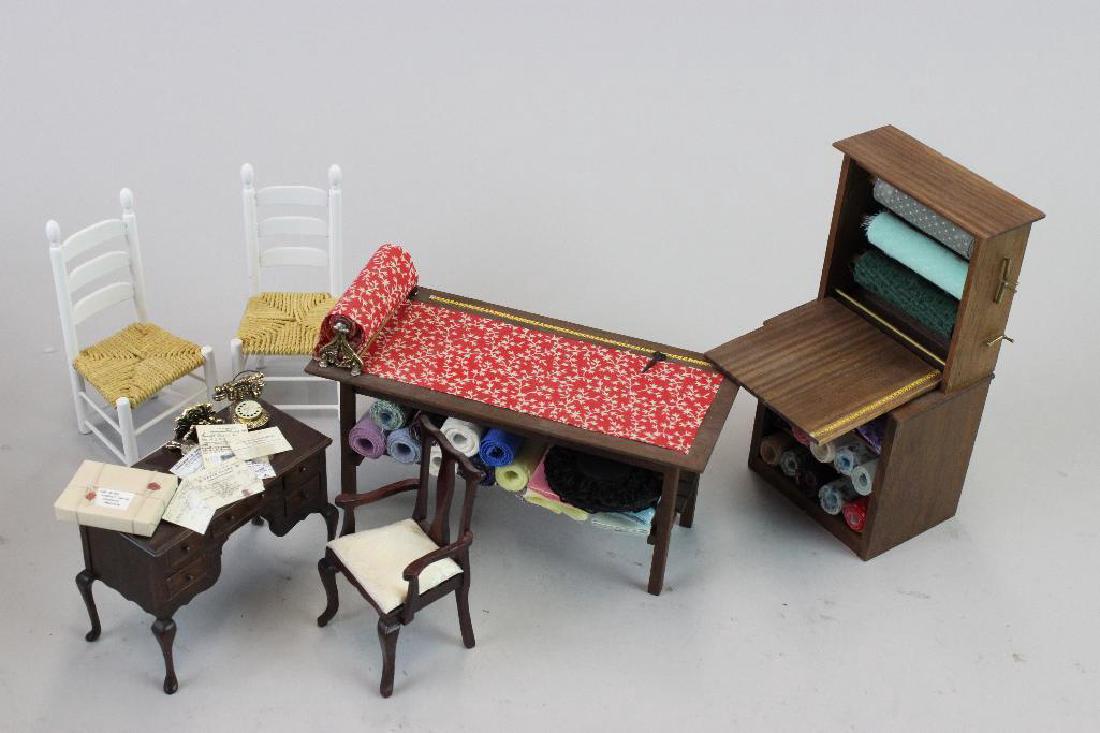Cutting table, fabric display, desk with chair and: Cutting table marked " CSF"; Fabric display marked "CSF"; Desk with items and chairs Bespaq; 2 chairs