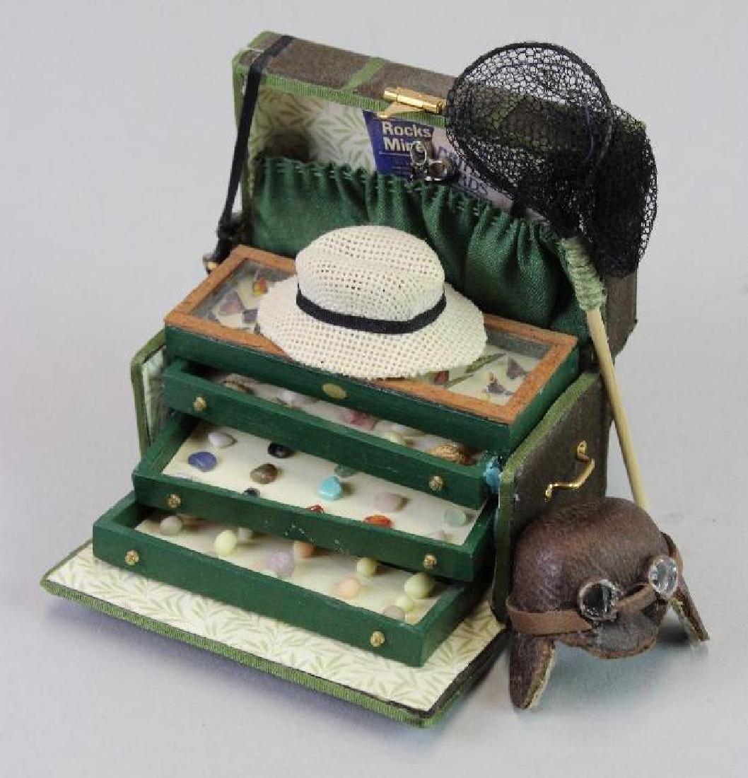 Explorer' s trunk; Aviator's helmet (1 of 3)