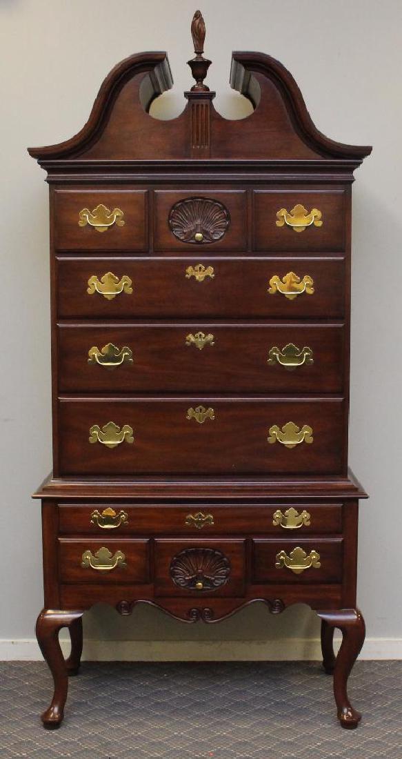 Henkel Harris Mahogany Highboy: 3 piece, scrolled broken pediment, ten drawers including two top and bottom shell carved drawers on cabriole legs, 89"h x 41"w x 21"d.