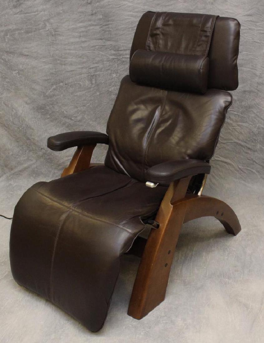 Human Touch Perfect Chair Electric Recliner: Brown leather seat and back, Serial No. B754709380, Model: PC-075, 46"h x 29"w x 20"d.