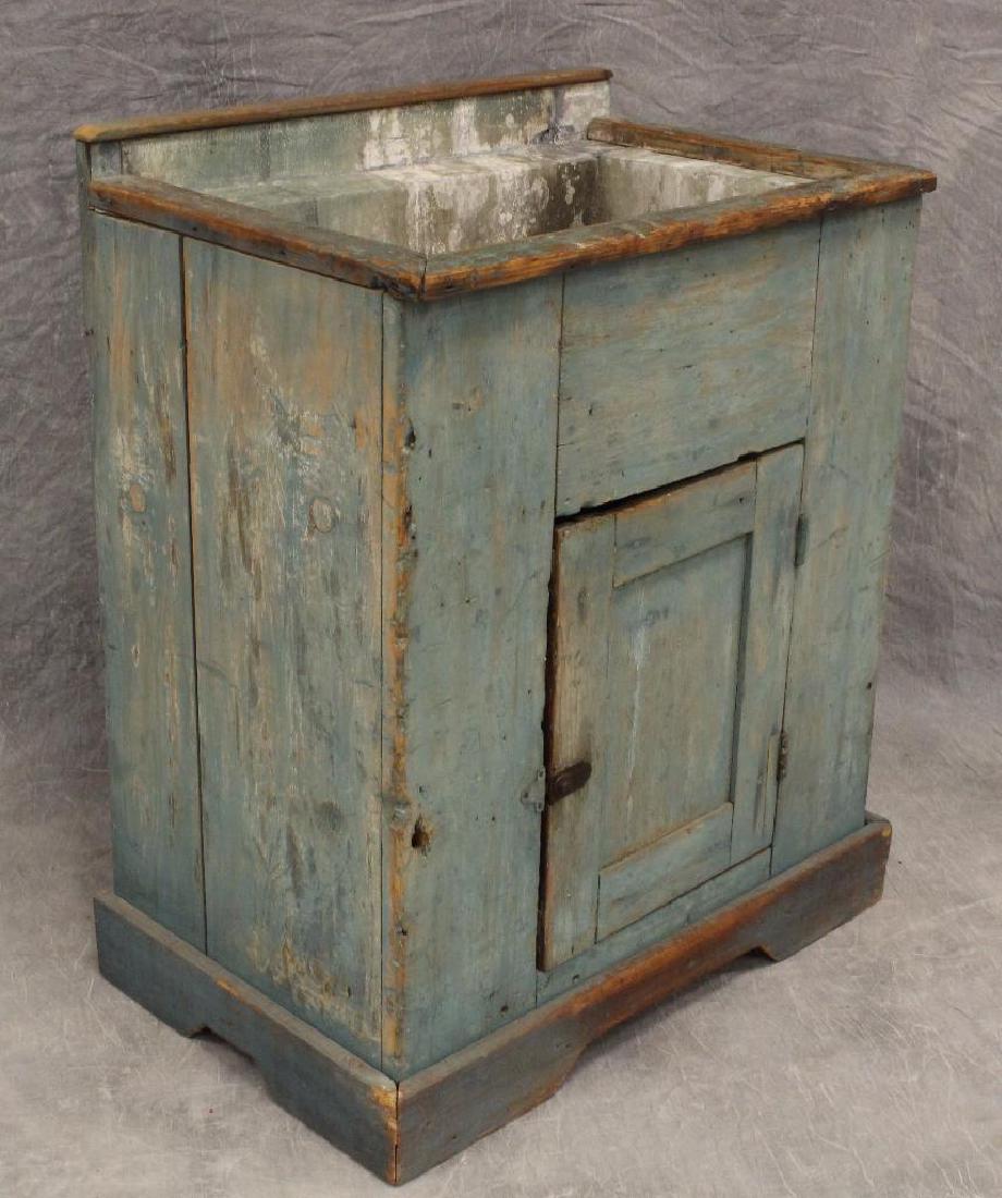 Blue Painted Dry Sink: Metal basin with drainage hole and backsplash over one door, 35"h x 28"w x 19"d.