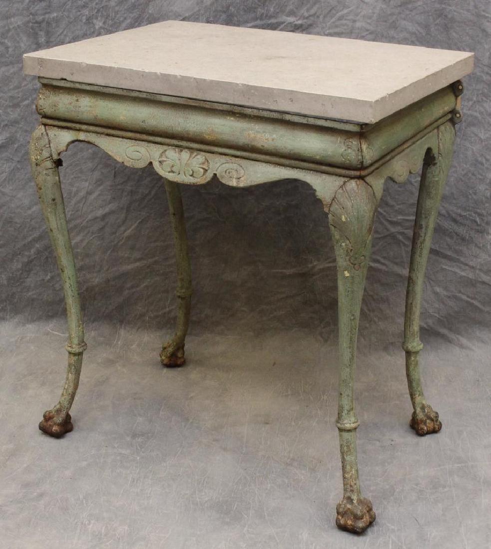 English Cast Iron Painted Garden Table: Granite top with a shaped apron on cabriole legs and paw feet, 32"h x 28"w x 19"d.