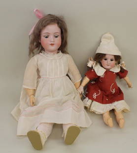 PAIR OF ANTIQUE ARMAND MARSEILLE 390 BISQUE HEAD DOLLS.: Both dolls have sleep eyes, open mouths, papier mache ball jointed bodies and are dressed in antique clothing. No shoes/socks. 15" Doll - brown eyes, brown human hair wig. Condition: wig is heavily