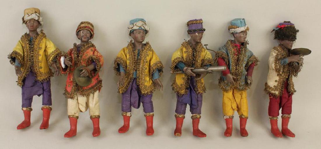 LOT OF (6) 10" ALL ORIGINAL MALE DOLLS FROM: This is a wonderful set of these (6) male dolls with composite head and lower arms, painted wooden boots. They all have very interesting features, molded hair. Dressed in fancy clothing of silks/broca