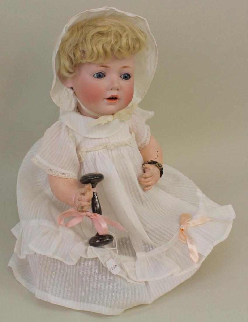 17" T. MADE IN GERMANY 13 J.D.K. 237 GES.GESCH N 1070: Blue sleep eyes, open mouth, blonde mohair wig, plaster pate. 5 Pc. papier mache bent limb baby body. Dressed in vintage dimity dress, petticoat and antique white leather booties. (1) Rhinestone brace