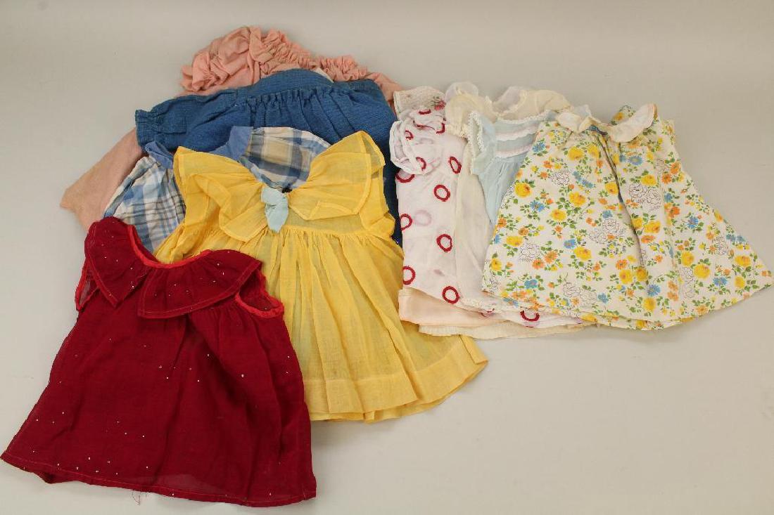DOLL PARTS & SUPPLIES: LOT OF ANTIQUE DOLL DRESSES. (1 of 4)