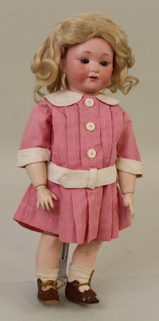 12" ARMAND MARSEILLE A.975.M. GERMANY 5/0. ANTIQUE: Blue sleep eyes, open mouth, very full blonde curly mohair wig. Fully jointed papier mache ball jointed toddler body. Dressed in antique dress, brown oilcloth shoes, socks. Condition: pimple on left c